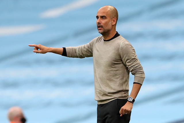 Manchester City’s Spanish manager Pep Guardiola reacts against Real Madrid during their UEFA Champions League round of 16 second leg match in Manchester, England, on Friday  (AFP photo by Nick Potts)