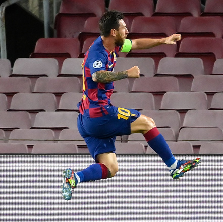 Barcelona’s Argentine forward Lionel Messi celebrates after scoring against Napoli during their UEFA Champions League round of 16 second leg match in Barcelona on Saturday (AFP photo by Lluis Gene)