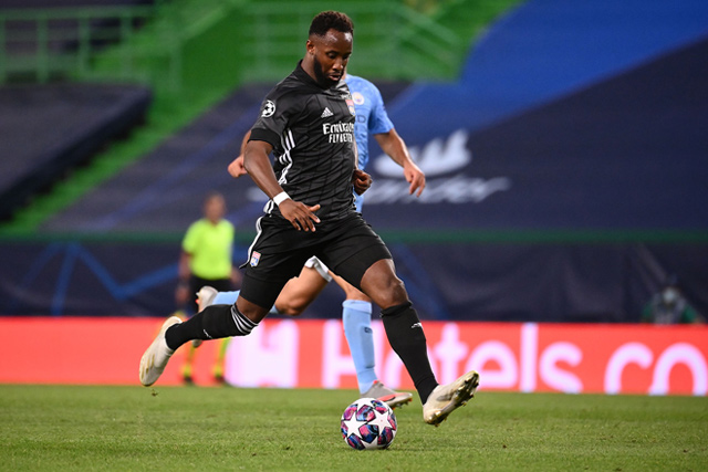 Lyon’s French forward Moussa Dembele prepares to shoot against Manchester City during their UEFA Champions League quarter-final match in Lisbon on Saturday  (AFP photo by Franck Fife)