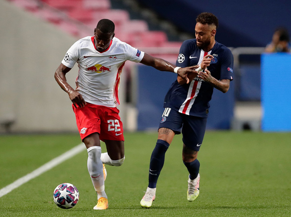 Leipzig’s defender Nordi Mukiele (left) fights for the ball with Paris Saint-Germain’s forward Neymar during their UEFA Champions League semifinal match in Lisbon on Tuesday  (AFP photo by Manu Fernandez)
