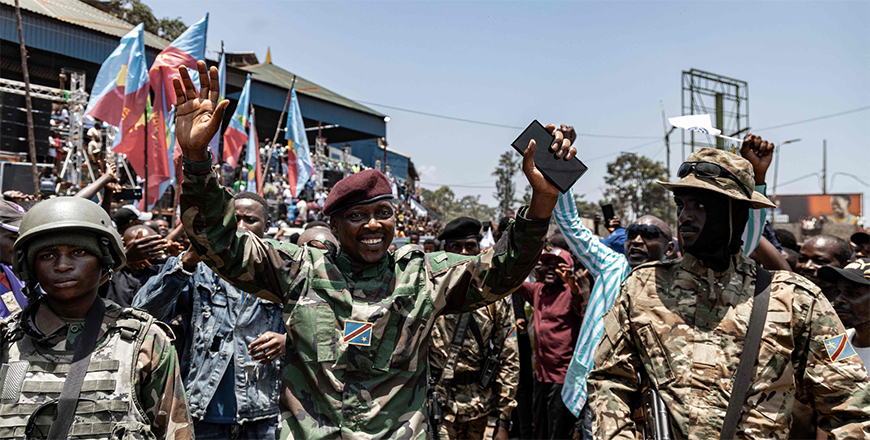 Willy Ngoma (centre), the M23 movement spokesperson, greets people attending a M23 movement meeting at Place de l’ independance in Bukavu on Thursday (AFP photo)