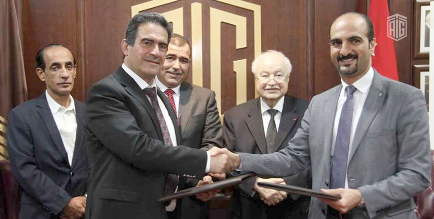 Participants during a signing ceremony of a cooperation agreement between the Jordan Press Foundation and the Talal Abu Ghazaleh Organisation on Monday (Petra photo)
