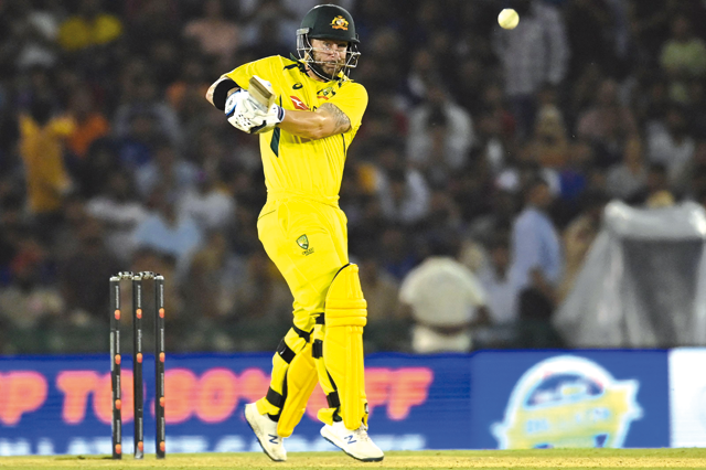 Australia’s Matthew Wade plays a shot against India during their first Twenty20 international match in Mohali on Tuesday  (AFP photo by Sajjad Hussain)
