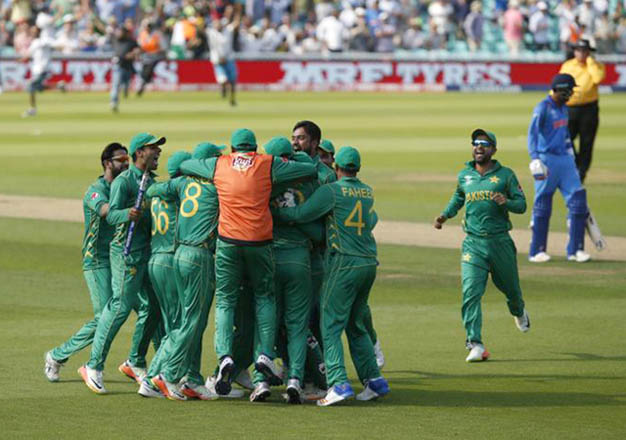 Pakistan’s Sarfraz Ahmed and teammates celebrate winning the ICC Champions Trophy against India in London on Sunday (Reuters photo by Paul Childs)