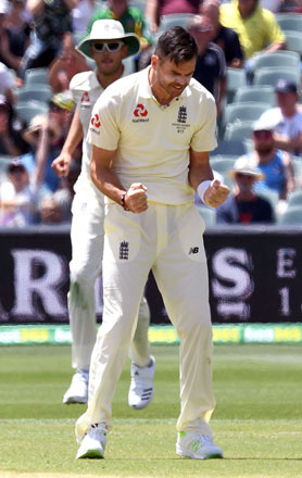 England paceman James Anderson celebrates dismissing Australian batsman Peter Handscomb on the fourth day of the second Ashes cricket Test match in Adelaide on Tuesday (AFP photo)