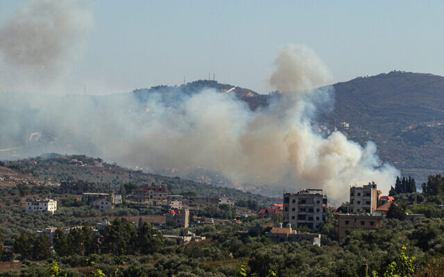 Smoke billows from a site targeted by the Israeli military in the southern Lebanese border village of Kafr Kila on July 29, 2024 (AFP photo)