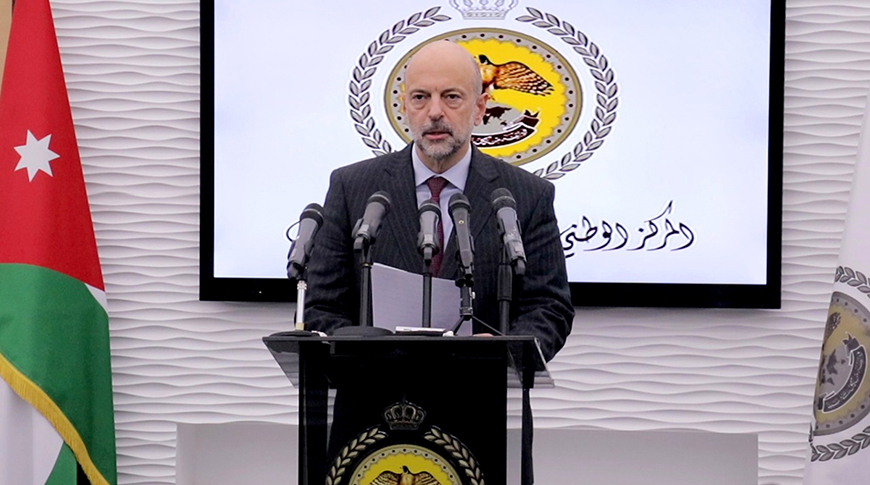 Prime Minister Omar Razzaz announces the activation of the Defense Law following a Royal Decree on Tuesday (Petra photo)