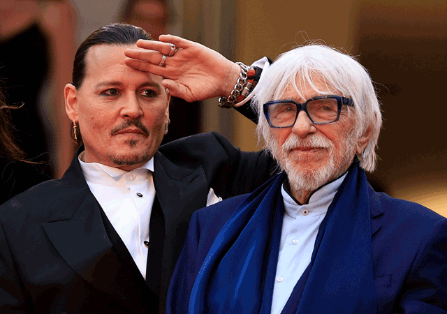 US actor Johnny Depp and French actor Pierre Richard (right) pose as they arrive for the opening ceremony and the screening of the film ‘Jeanne du Barry’ during the 76th edition of the Cannes Film Festival in Cannes, France, on Tuesday (AFP photo by Valery Hache)