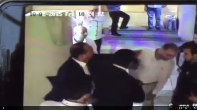 A video grab purports a brother of an MP hitting an Egyptian worker at a diner in Aqaba recently