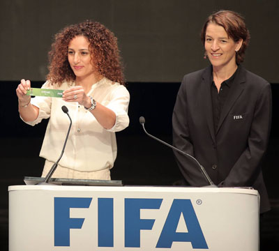 Samar Nassar, the CEO of the FIFA U-17 Women’s World Cup local organising committee, holds a paper with the word Jordan during the competition’s draw at Al Hussein Cultural Centre in Amman on Monday (Photo courtesy of Ahmad Al Ameen)
