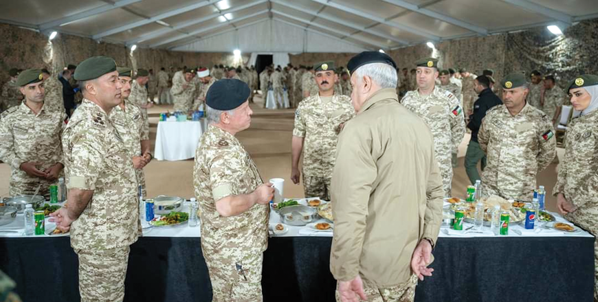 His Majesty King Abdullah, the Supreme Commander of the Jordan Armed Forces-Arab Army, joins the Southern Military Region’s Prince Zeid .Bin Al Hussein 93rd Mechanised Brigade for iftar  (Photo of Royal Court)