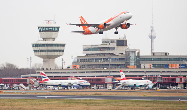 An aircraft of low-cost carrier EasyJet takes off at Tegel Airport in Berlin on Friday (AFP photo)