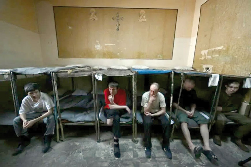 Slumped against his metal bed frame in a detention centre in Ukraine’s capital Kyiv, Sergeant Nikolai Matveev relives the ambush that made him one of the conflict’s first prisoners of war  (AFP photo)