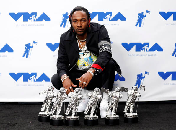 Kendrick Lamar with his awards at the 2017 MTV Video Music Awards in Inglewood, California, on Sunday (Reuters photo by Danny Moloshok)