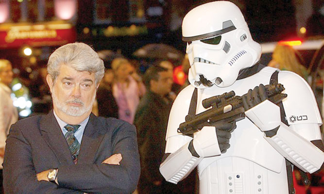 Star Wars creator George Lucas poses with a Storm Trooper at the UK premiere of Revenge of the Sith in 2005  (AP photo)