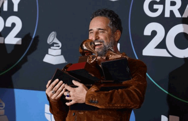 Uruguayan musician Jorge Drexler poses with the award for Record of the Year and multiple others during the 23rd Annual Latin Grammy awards at the Mandalay Bay’s Michelob Ultra Arena in Las Vegas, Nevada, on November 17 (AFP photo by Ronda Churchill)