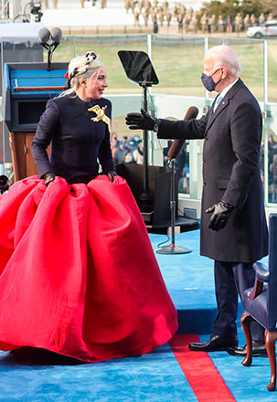 US President-elect Joe Biden gestures towards singer Lady Gaga during his inauguration as the 46th President of the United States at the US Capitol in Washington on Wednesday (AFP photo by Jonathan Ernst)