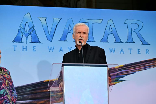  Director James Cameron speaks during an event where he and producer Jon Landau will place their handprints in cement at the forecourt of the TCL Chinese Theatre in Los Angeles, California, on January 12 (AFP photo)