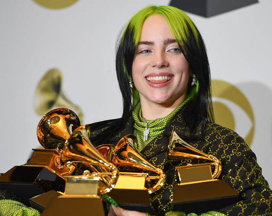 US singer-songwriter Billie Eilish poses in the press room with her awards during the 62nd Annual Grammy Awards in Los Angeles, on January 27, 2020 (AFP photo by Frederic J. Brown)