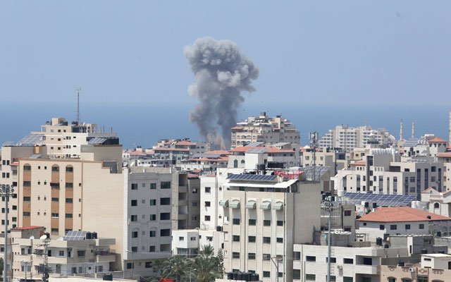 Smoke rises after the Israeli occupation warplanes carried out an air strike over residential areas in Gaza City, Gaza, on Tuesday (Anadolu Agency photo)