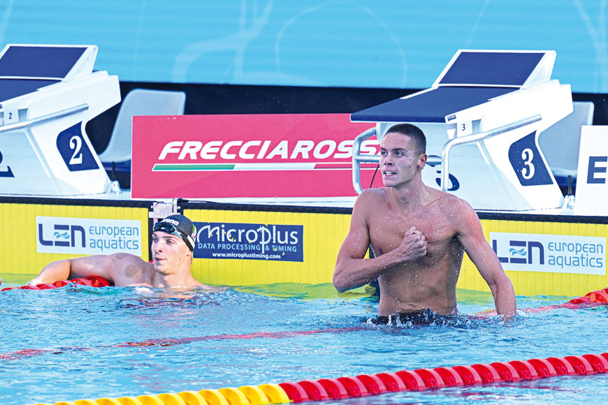 Romania’s David Popovici reacts after winning and setting a new world record in the Men’s 100m freestyle final event at the LEN European Aquatics Championships in Rome on Saturday  (AFP photo by Alberto Pizzoli)