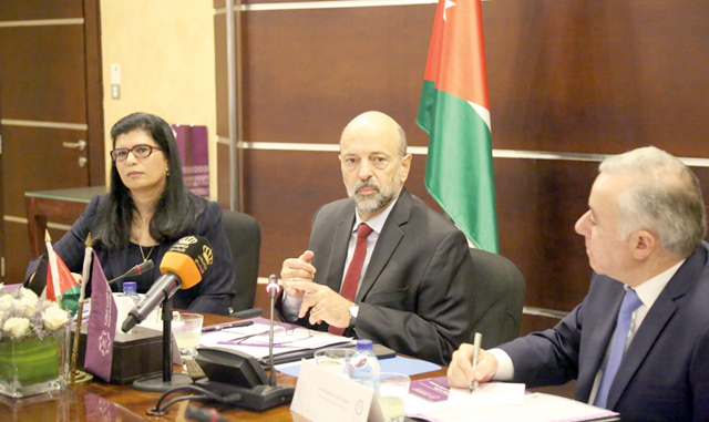 Prime Minister Omar Razzaz and HRH Princess Sumaya are seen during a meeting at the Royal Scientific Society headquarters on Monday  (Petra photo)