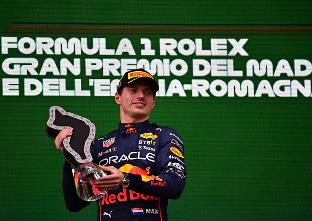 Red Bull Racing’s Dutch driver Max Verstappen holds the winner’s trophy as he celebrates on the podium after the Emilia Romagna Formula One Grand Prix in Imola, Italy, on Sunday  (AFP photo by Andrej Isakovic)