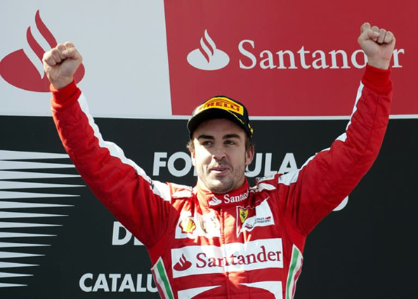 Fernando Alonso celebrates victory at the 2013 Spanish Grand Prix in his Ferrari days (AFP photo)
