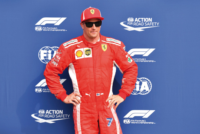Ferrari’s Finnish driver Kimi Raikkonen celebrates winning the pole position after the qualifying session at the Autodromo Nazionale circuit in Monza on Saturday ahead of the Italian Formula One Grand Prix (AFP photo by Andrej Isakovic)