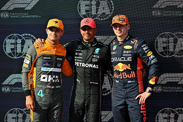 Left to right: Third-placed McLaren’s British driver Lando Norris, pole position winner Mercedes’ British driver Lewis Hamilton and second-placed Red Bull Racing’s Dutch driver Max Verstappen pose after the qualifying session for the Hungarian Grand Prix on Saturday (AFP photo by Attila Kisbenedek)