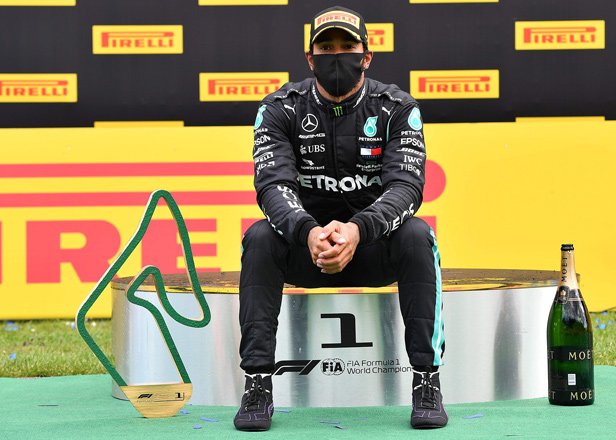 Winner Mercedes’ British driver Lewis Hamilton reacts on the podium after winning the Formula One Styrian Grand Prix race in Spielberg, Austria, on Sunday  (AFP photo by Joe Klamar)