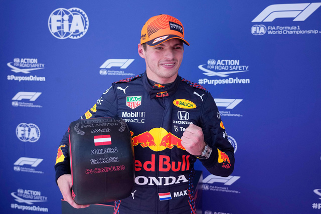 Red Bull’s Dutch driver Max Verstappen celebrates after claiming the pole position at the Red Bull Ring race track in Spielberg, Austria, on Saturday (AFP photo by Darko Vojinovic)