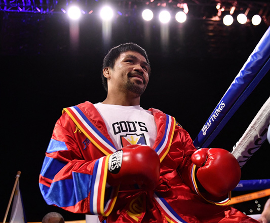 Philippines’ Manny Pacquiao enters the ring for his fight against Cuba’s Yordenis Ugas during their WBA Welterweight Championship boxing match in Las Vegas, Nevada, on August 21 (AFP photo by Patrick T. Fallon)