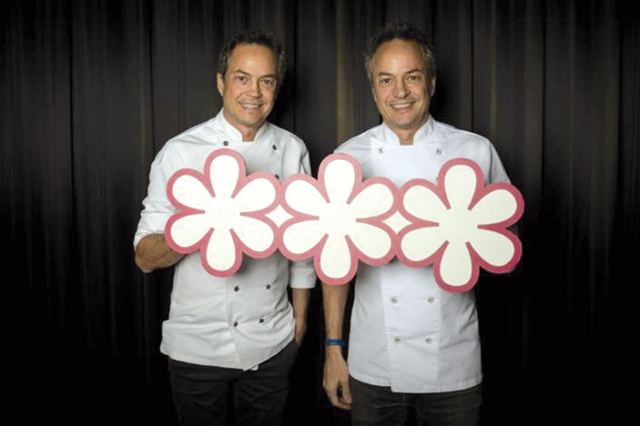 Spanish twins chefs, Javier and Sergio Torres, pose after their restaurant won a third Michelin star on November 22 (AFP photo by Josep Lago)