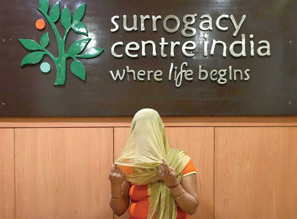 An Indian surrogate mother, Manu Kani, sits at The Surrogacy Centre India clinic in New Delhi on November 3 (AFP photo by Sajjad Hussain)