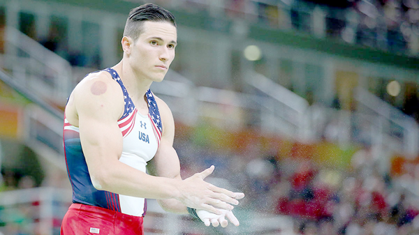 Alex Naddour of the US gymnastics team sports his cupping marks, in undated photo, at the Rio Olympics (AFP photo by Alex Livesey)