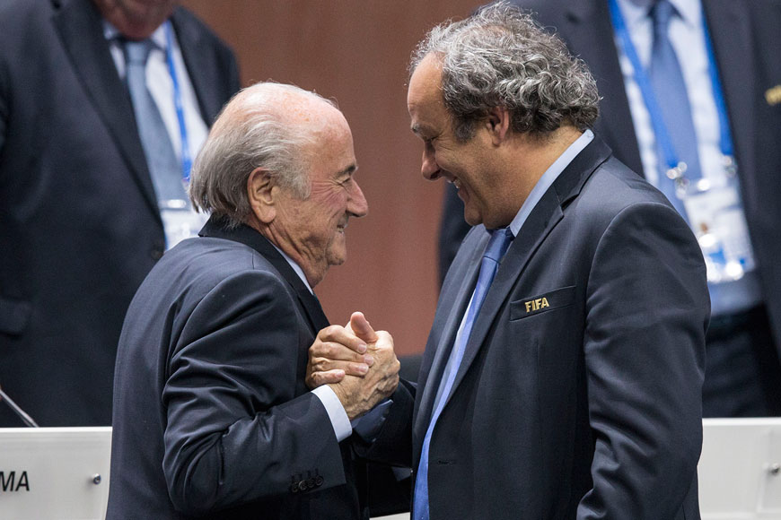 FIFA President Sepp Blatter is greeted by UEFA President Michel Platini (right) at the Hallenstadion in Zurich, Switzerland, on Friday (AP photo by Patrick B. Kraemer)