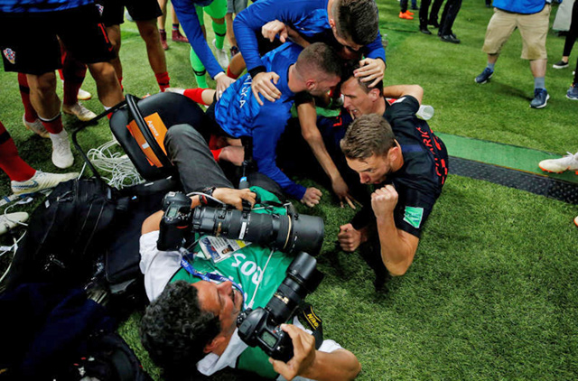 A 2018 FIFA World Cup photographer surprisingly became a part of Croatia’s goal celebration versus England in the semifinal of the 2018 World Cup  (Reuters photo)