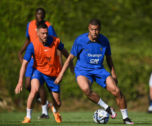 France’s forward Kylian Mbappe and France’s midfielder Jordan Veretout (left) vie for the ball during a training session in Clairefontaine-en-Yvelines on Tuesday (AFP photo by Franck Fife)