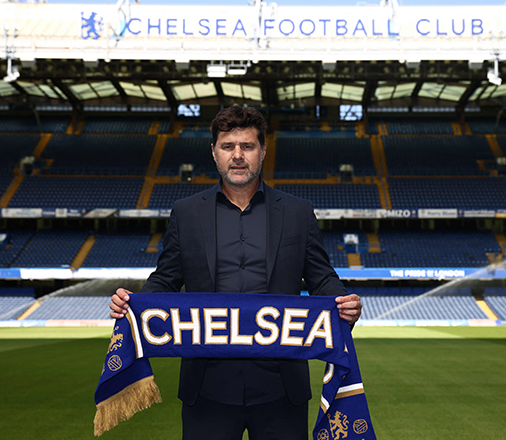 Chelsea’s Argentinian head coach Mauricio Pochettino poses beside the pitch at Stamford Bridge in London on Friday, as he is introduced to the media as the new Chelsea manager (AFP photo by Henry Nicholls)