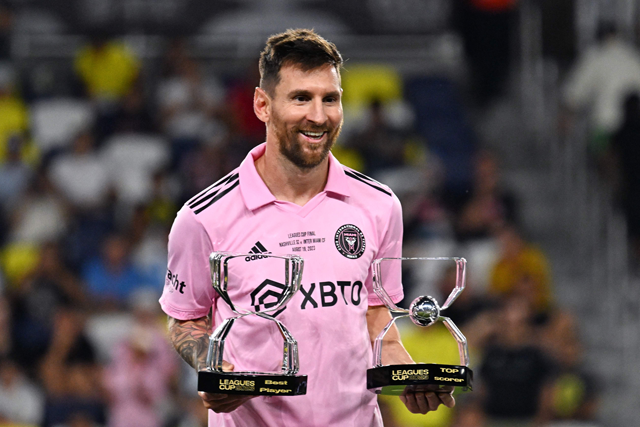 Inter Miami’s Lionel Messi poses with the awards for Best Player and Top Scorer after the team won the Leagues Cup in Nashville, Tennessee, on Saturday (AFP photo by Chandan Khanna)