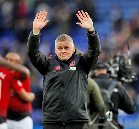 Manchester United interim manager Ole Gunnar Solskjaer celebrates after the Premier League match against Leicester City in Leicester on Sunday (Reuters photo by Andrew Boyers)