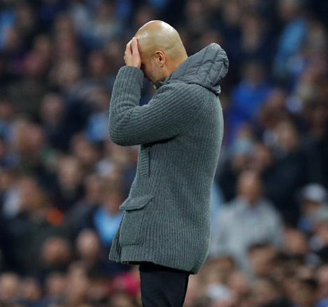 Manchester City’s Spanish manager Pep Guardiola reacts during the UEFA Champions League quarter-final second leg football match against Tottenham Hotspur at the Etihad Stadium in Manchester on Wednesday   (Reuters photo by Phil Noble)