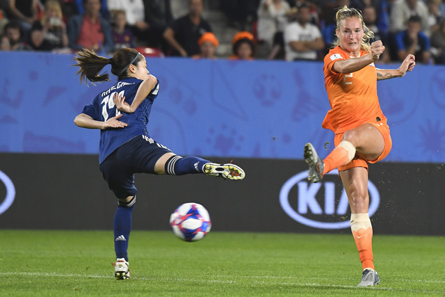 Netherlands’ defender Desiree van Lunteren (right) vies with Japan’s midfielder Yui Hasegawa during their France 2019 Women’s World Cup football match in Rennes, France, on Tuesday  (AFP photo by Damien Meyer)