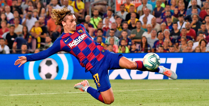 Barcelona’s French forward Antoine Griezmann scores a goal during the Spanish League football match against Real Betis in Barcelona on Sunday (AFP photo by Josep Lago)