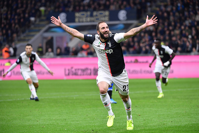 Juventus’ Argentinian forward Gonzalo Higuain celebrates after scoring against the Inter in Milan on Sunday  (AFP photo by Alberto Pizzoli)