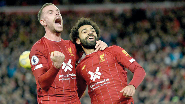 Liverpool’s Jordan Henderson (left) and Mohamed Salah (AFP photo)