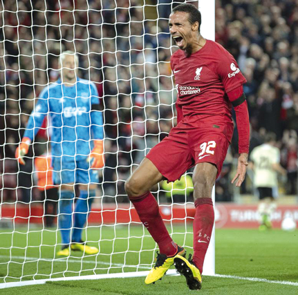 Liverpool’s Joel Matip celebrates scoring against Ajax during their UEFA Champions League Group A match in Liverpool on Tuesday (AFP photo)