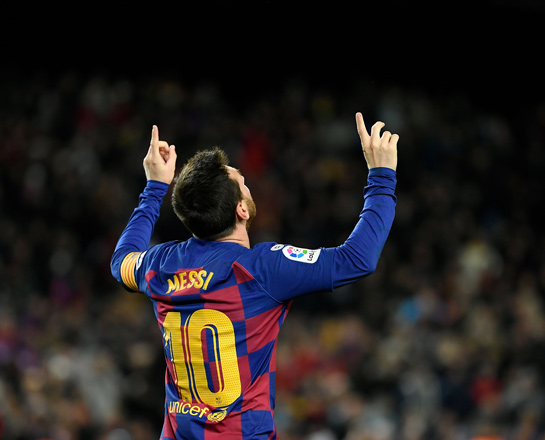 Barcelona’s Argentine forward Lionel Messi celebrates scoring the opening goal against Granada during their Spanish league football match in Barcelona on Sunday  (AFP photo by Lluis Gene)