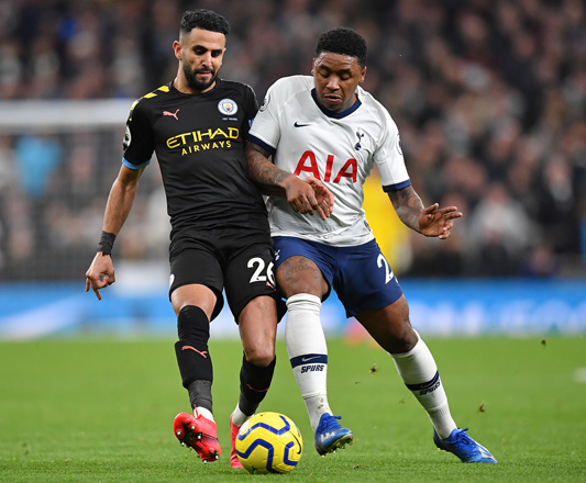 Manchester City’s Algerian midfielder Riyad Mahrez (left) vies with Tottenham Hotspur’s Dutch midfielder Steven Bergwijn during their English Premier League match in London on Sunday  (AFP photo by Ben Stansall)